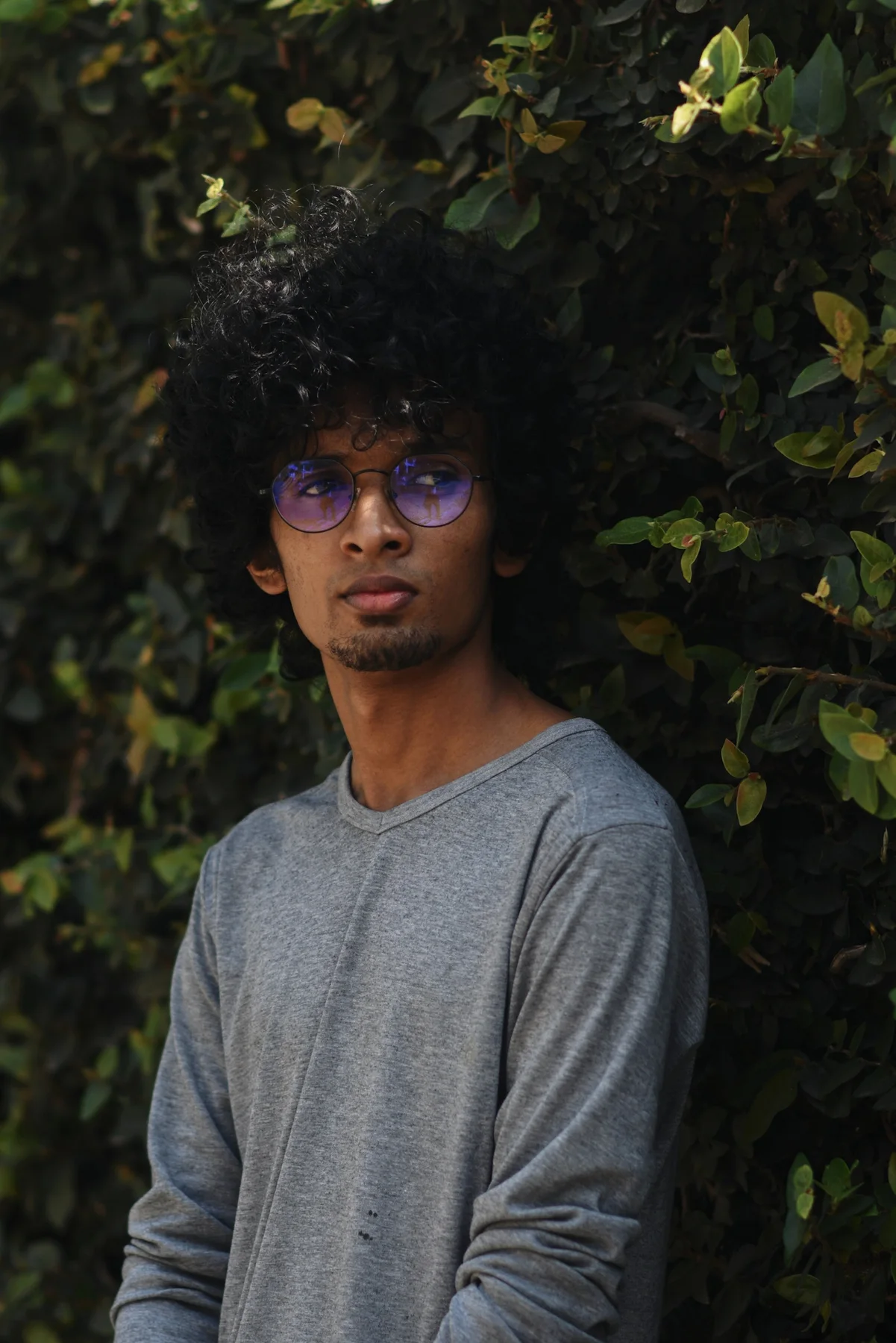 Portrait framed by leaves