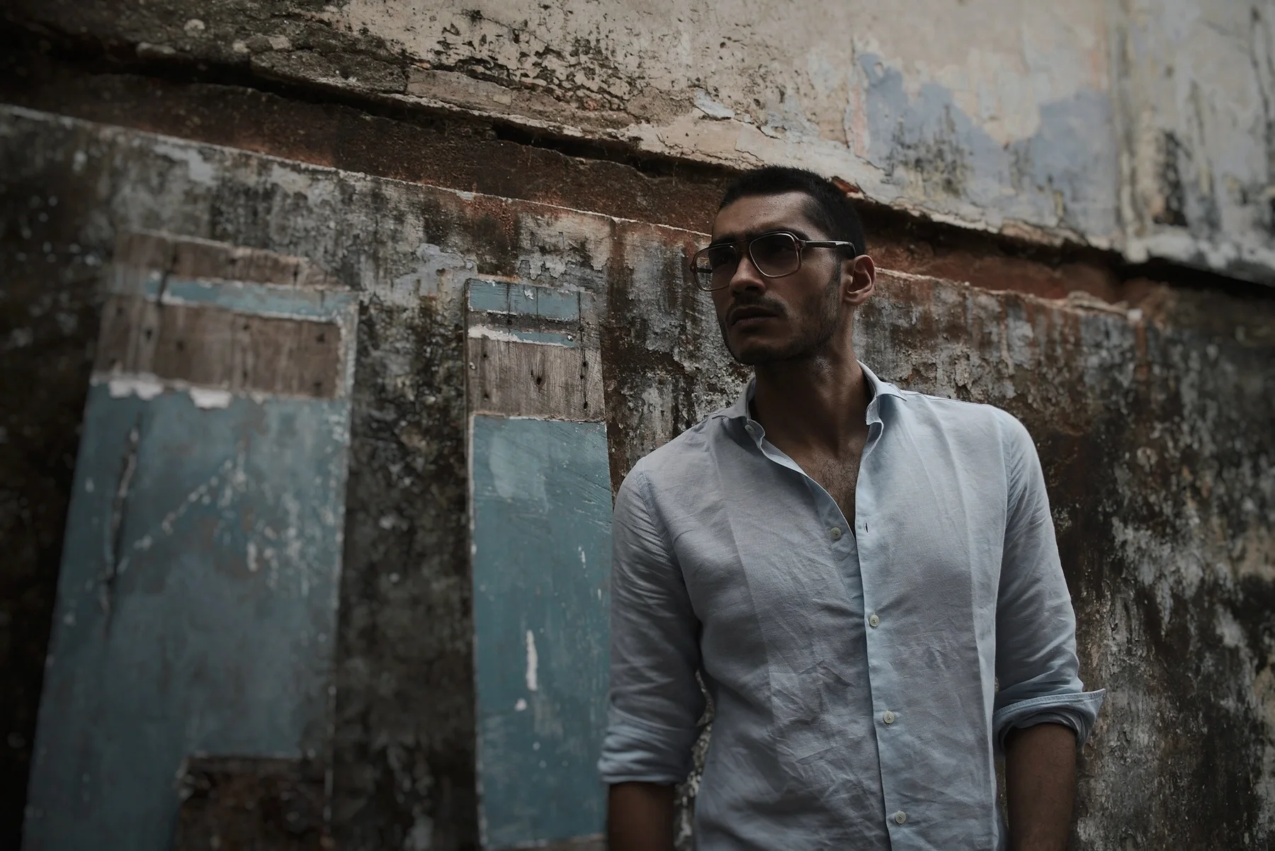 Portrait against a weathered wall